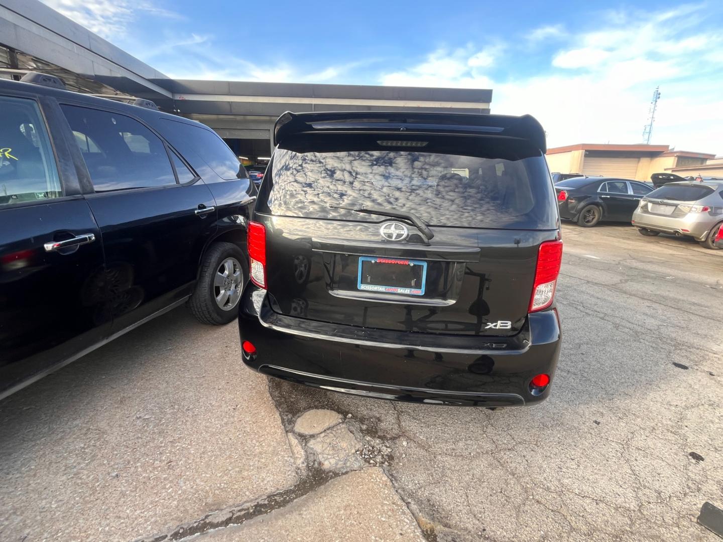 2015 BLACK SCION XB BASE 5-Door Wagon 5-Spd MT (JTLZE4FEXFJ) with an 2.4L L4 DOHC 16V engine, 5-Speed Manual transmission, located at 8101 E. Skelly Dr., Tulsa, OK, 74129, (918) 592-3593, 36.121891, -95.888802 - Photo#1